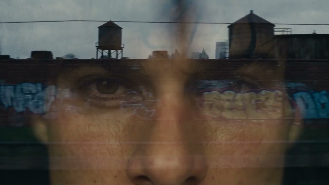 A young man searches downtown New York through subway and street scenes